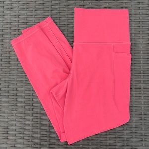 Athleta Salutation stash pocket II 7/8 tight Size medium